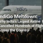 A navy-blue infographic summarizing IndiGo flight disruptions, explaining the causes such as new crew rest rules, pilot shortages, system failures, and the nationwide impact on passengers due to over 500 cancelled flights.