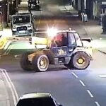Stolen heavy machinery used to remove an ATM from a building wall in the United Kingdom