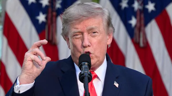 Donald Trump outside a courthouse as legal proceedings continue in the BBC subpoena case