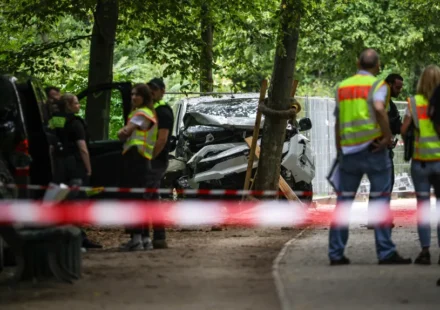 Police officers securing an area in Berlin following the Pride attack investigation