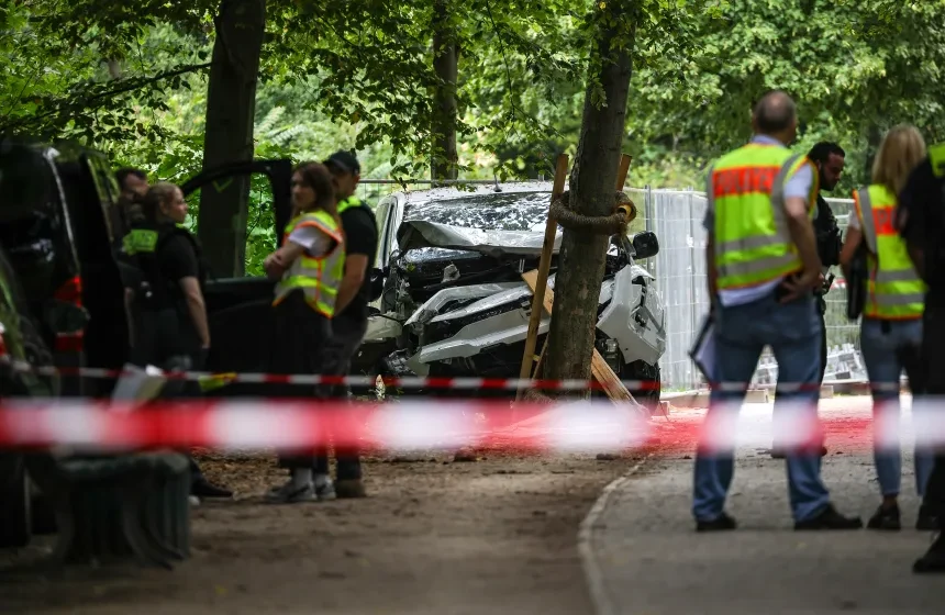 Police officers securing an area in Berlin following the Pride attack investigation
