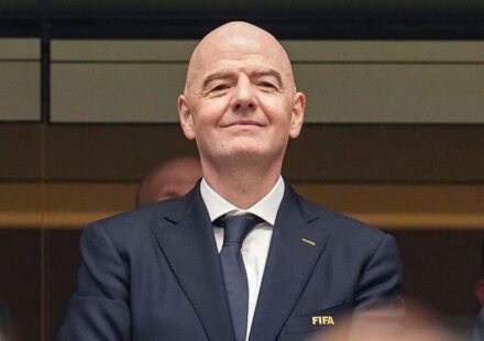 FIFA President Gianni Infantino with the FIFA World Cup trophy during discussions on tournament expansion