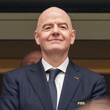 FIFA President Gianni Infantino with the FIFA World Cup trophy during discussions on tournament expansion