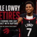 Kyle Lowry poses with a Toronto Raptors jersey after signing a one-day contract before announcing his retirement.