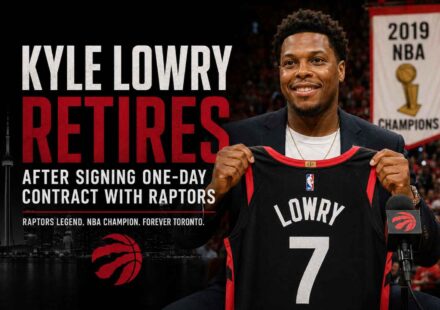 Kyle Lowry poses with a Toronto Raptors jersey after signing a one-day contract before announcing his retirement.