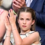 Princess Charlotte wearing a charm bracelet while attending the Wimbledon men's final with the Royal Family