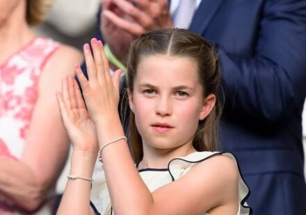 Princess Charlotte wearing a charm bracelet while attending the Wimbledon men's final with the Royal Family