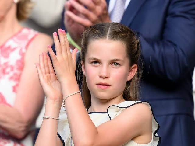Princess Charlotte wearing a charm bracelet while attending the Wimbledon men's final with the Royal Family