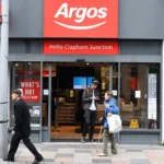 Exterior of a Sainsbury's supermarket with an Argos collection point after the £120m sale announcement
