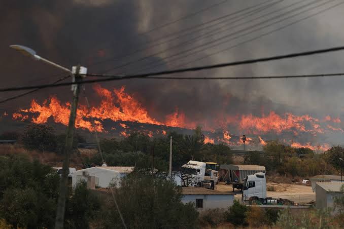 Massive wildfire burning through a forested area in Spain as emergency crews respond