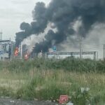 Smoke rises after a reported Ukrainian drone strike on Russia’s largest oil refinery