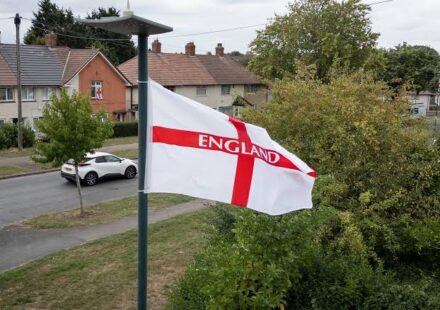 Union flags hanging across a UK street amid political controversy